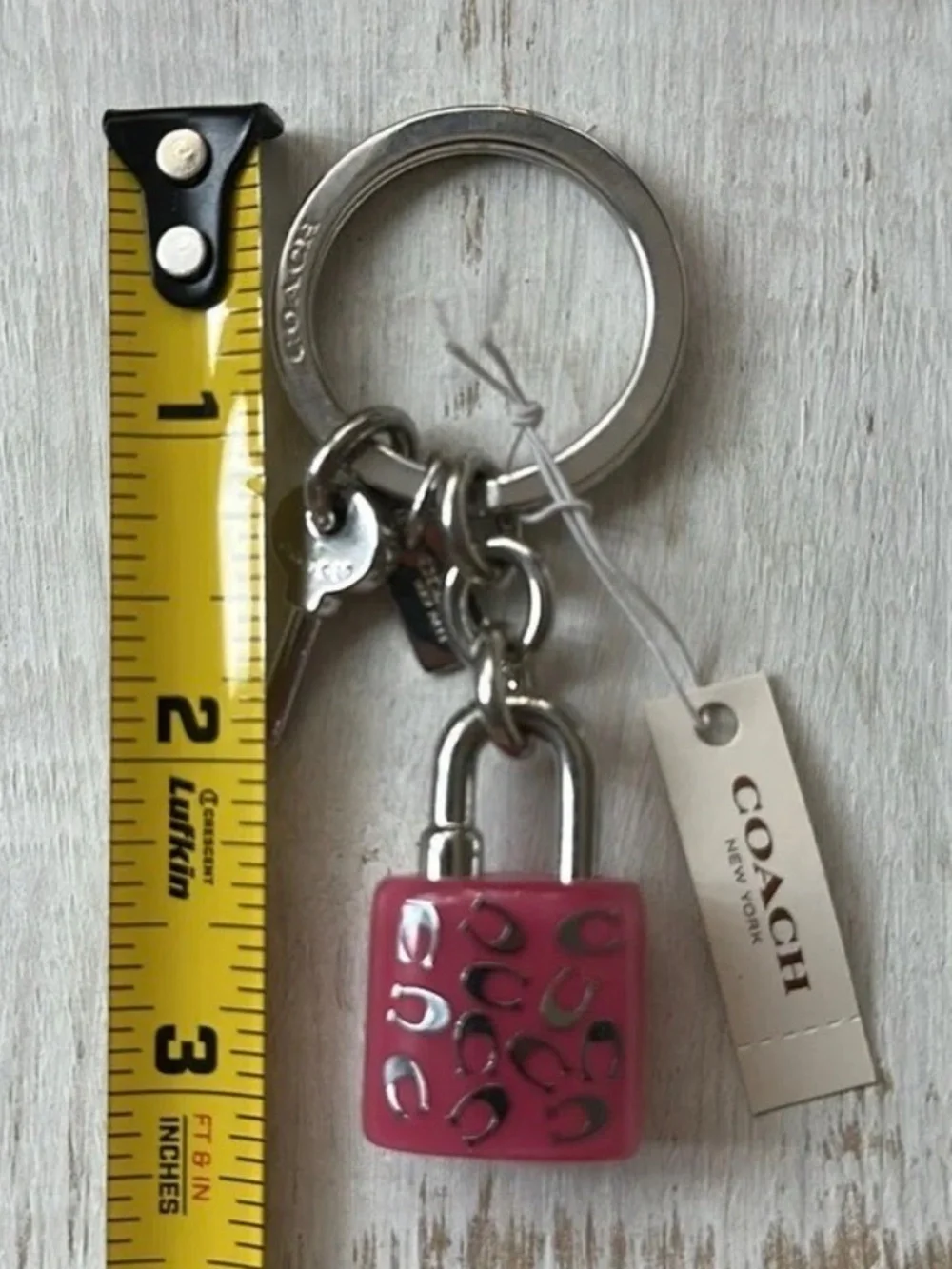 COACH LOCK AND KEY KEY RING  PURSE CHARM PINK AND SILVER NEW NWT (RETIRED) W/BOX